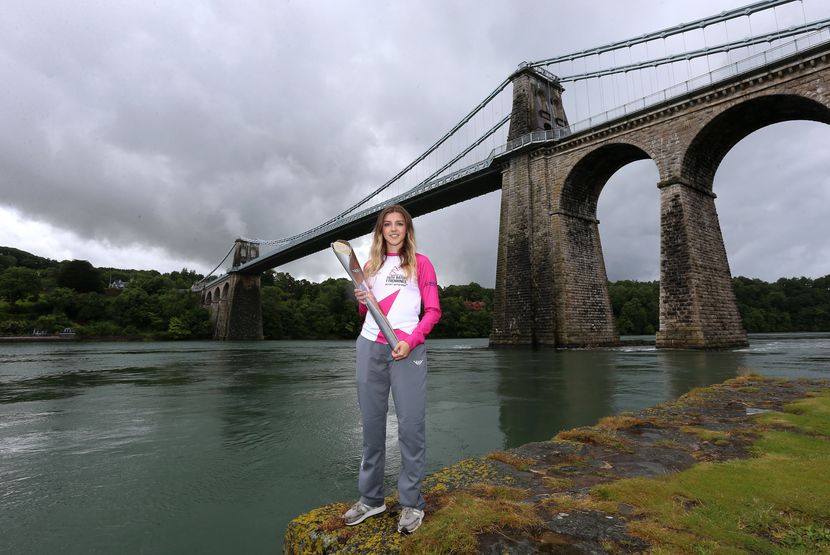 Wales- Batonbearer Teleri Sion at Menai Suspension Bridge Wales- Batonbearer Teleri Sion at Menai Suspension Bridge