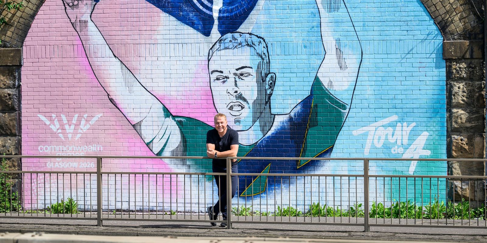 Sir Chris Hoy unveils Glasgow mural to make Glasgow 2026 x Tour de 4 partnership