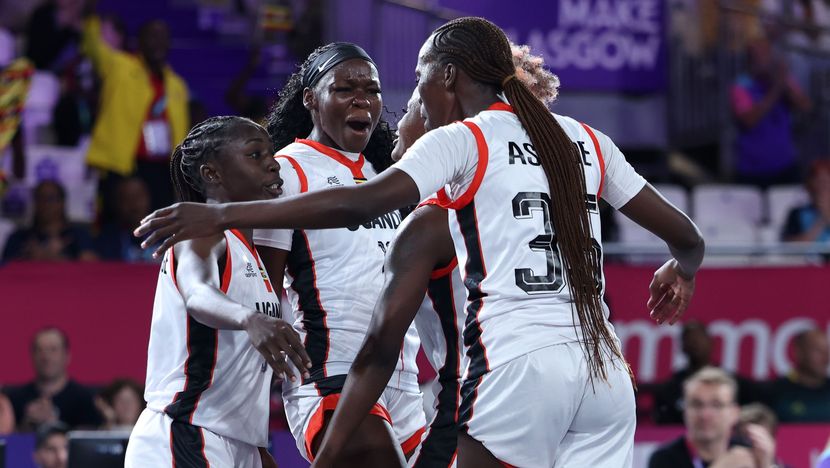 Melissa Akullu of Team Uganda celebrates with teammates after their victory against Team Jamaica