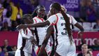 Melissa Akullu of Team Uganda celebrates with teammates after their victory against Team Jamaica