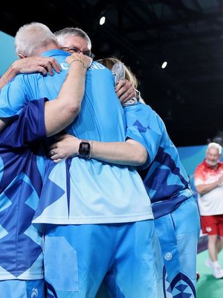 Team Scotland celebrate winning Para Mixed Pairs B2-B3 gold-medal match