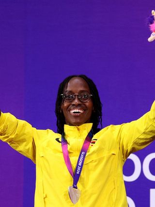 G2026: Husnah Kukundakwe of Team Uganda celebrates during the Women's 100m Breaststroke SB8 Medal Ceremony
