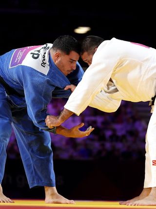 G2026: Giannis Antoniou of Team Cyprus and Kayhan Ozcicek-Takagi of Team Australia compete during the Men's +100kg Gold Medal contest