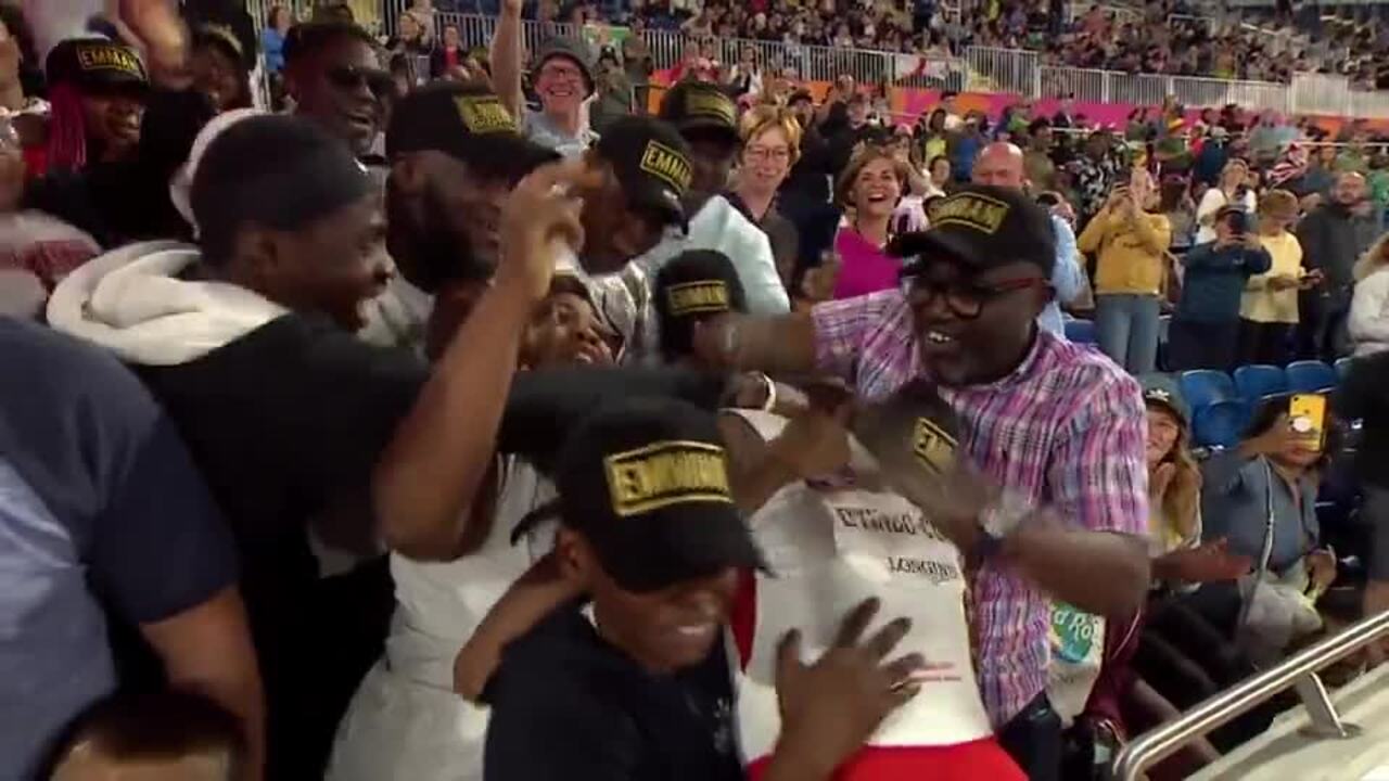 Emmanuel Temitayo OyinboCoker celebrates winning Gold in Men's T45/47 100M